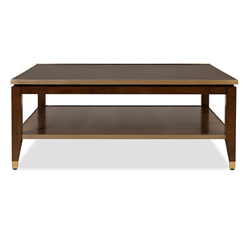 Sovereign Cocktail Table, shown in dark brown and warm walnut with wood, wood veneer, and open lower storage shelf.