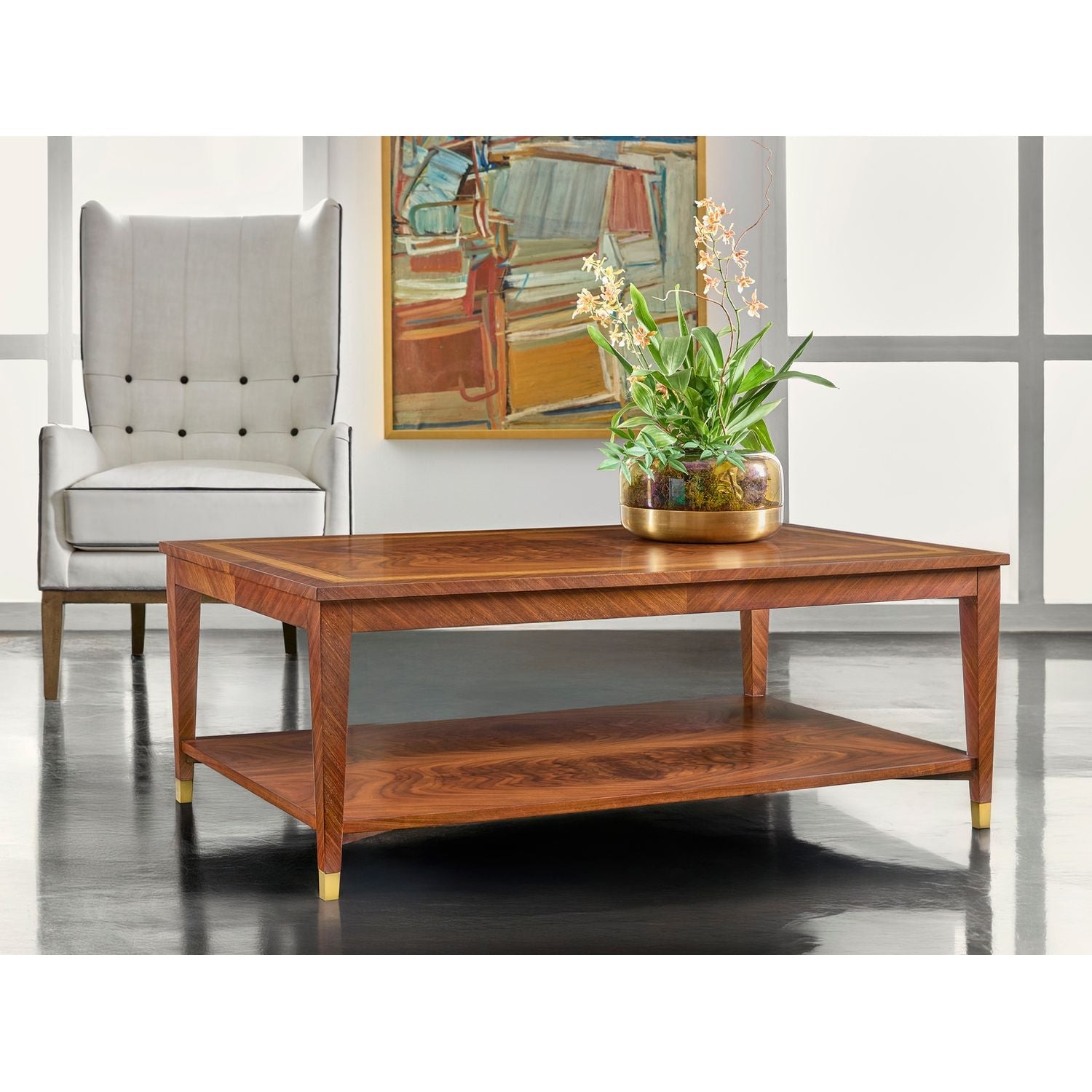 Alternate view of Bezier Cocktail Table in warm walnut brown and amber honey.