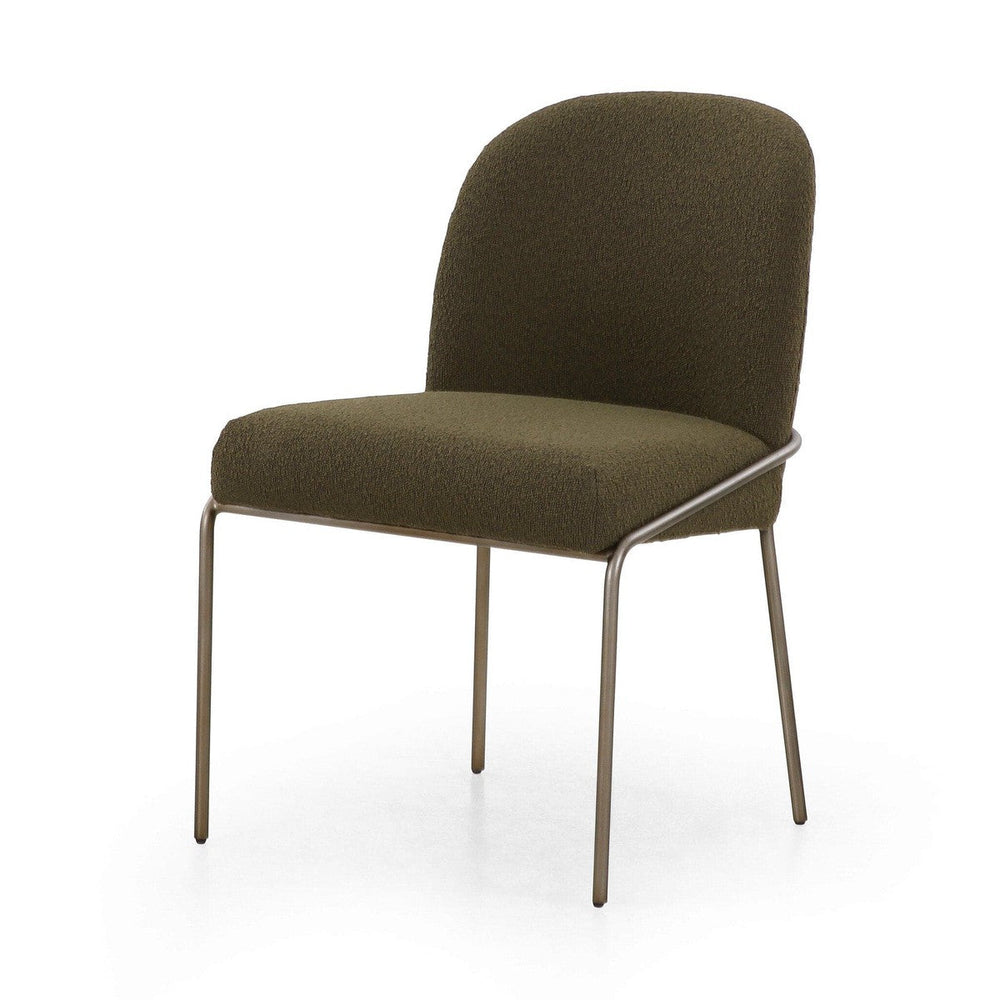 Astrud dining chair upholstered in textured olive bouclé.