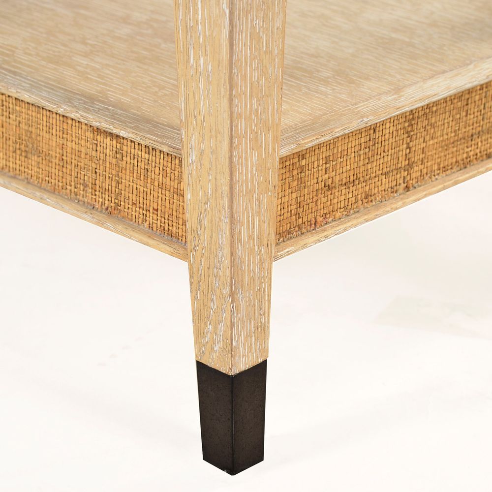 Additional view of Carrick Coffee Table in light blonde and beige, featuring whitewashed and open lower storage shelf.