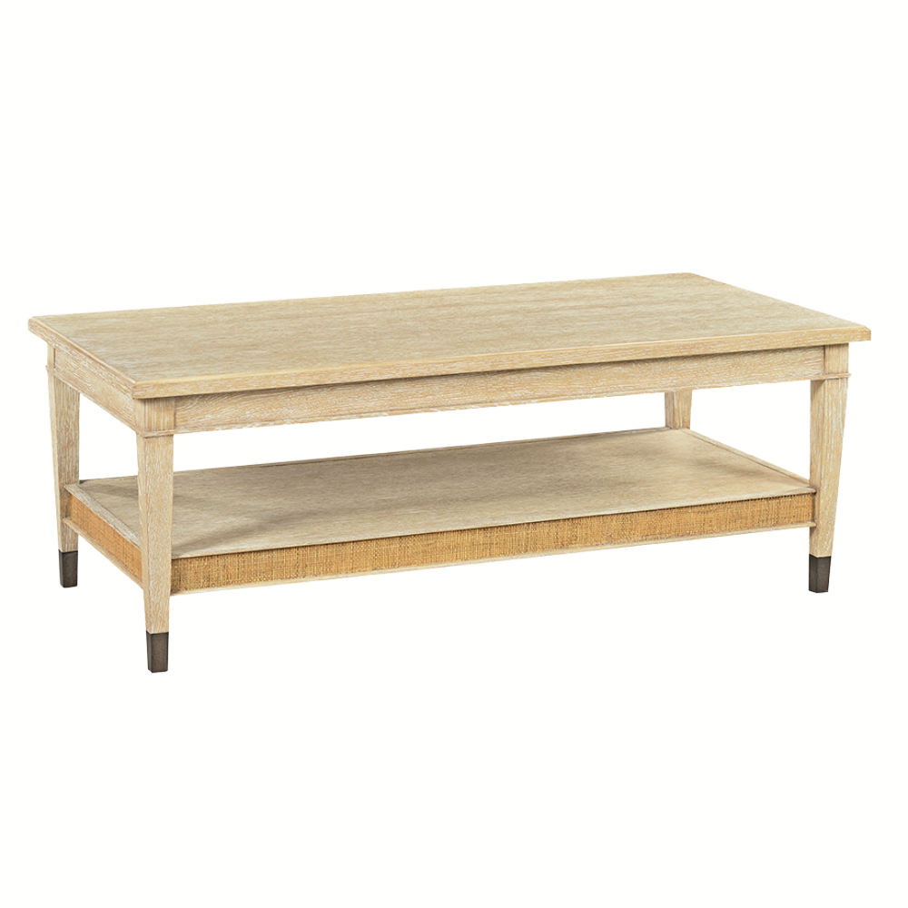 Carrick Coffee Table, shown in light blonde and beige with wood, rattan, and open lower storage shelf.
