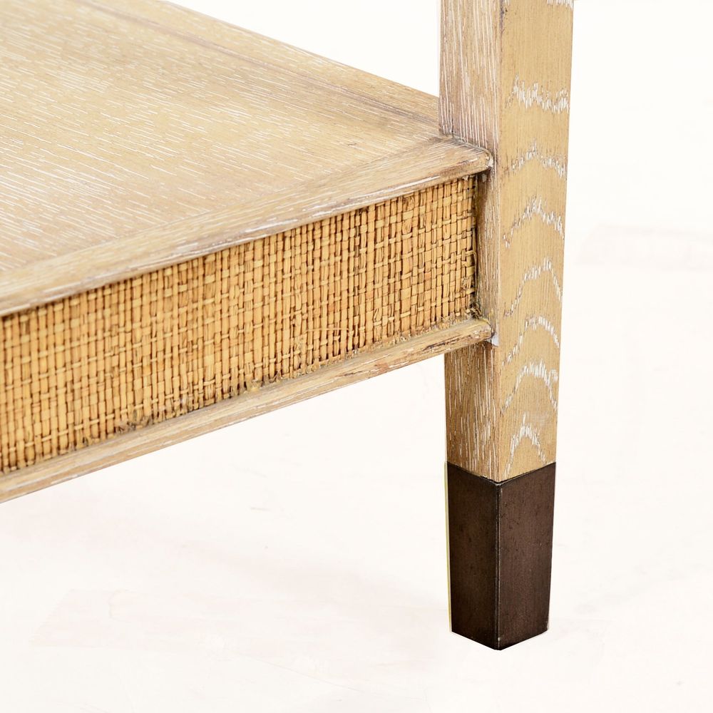 Additional view of Carrick Console Table, featuring whitewashed, wood, raffia, and full-length lower open shelf.
