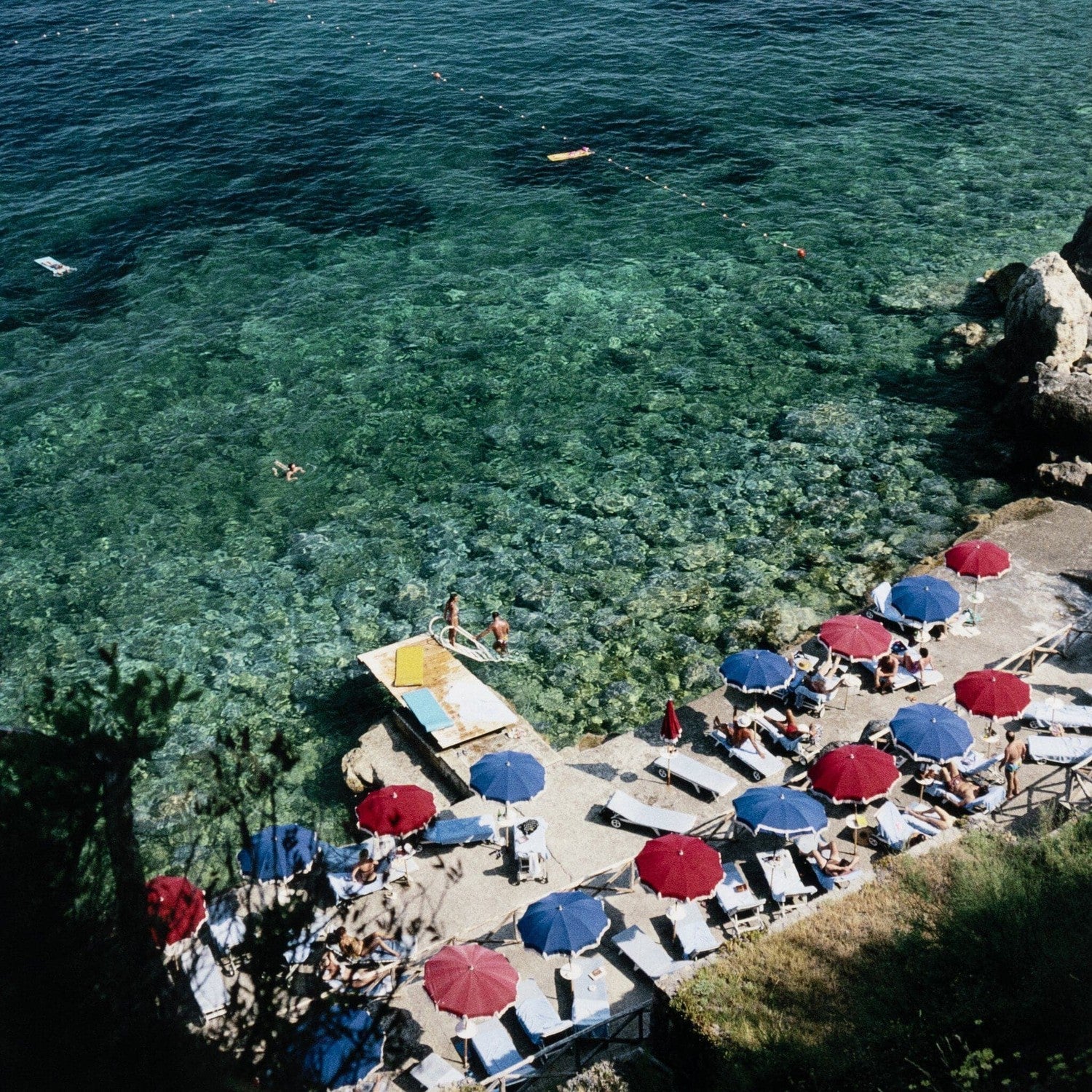 Porto Ercole Beach by Slim Aarons - White Maple Floater