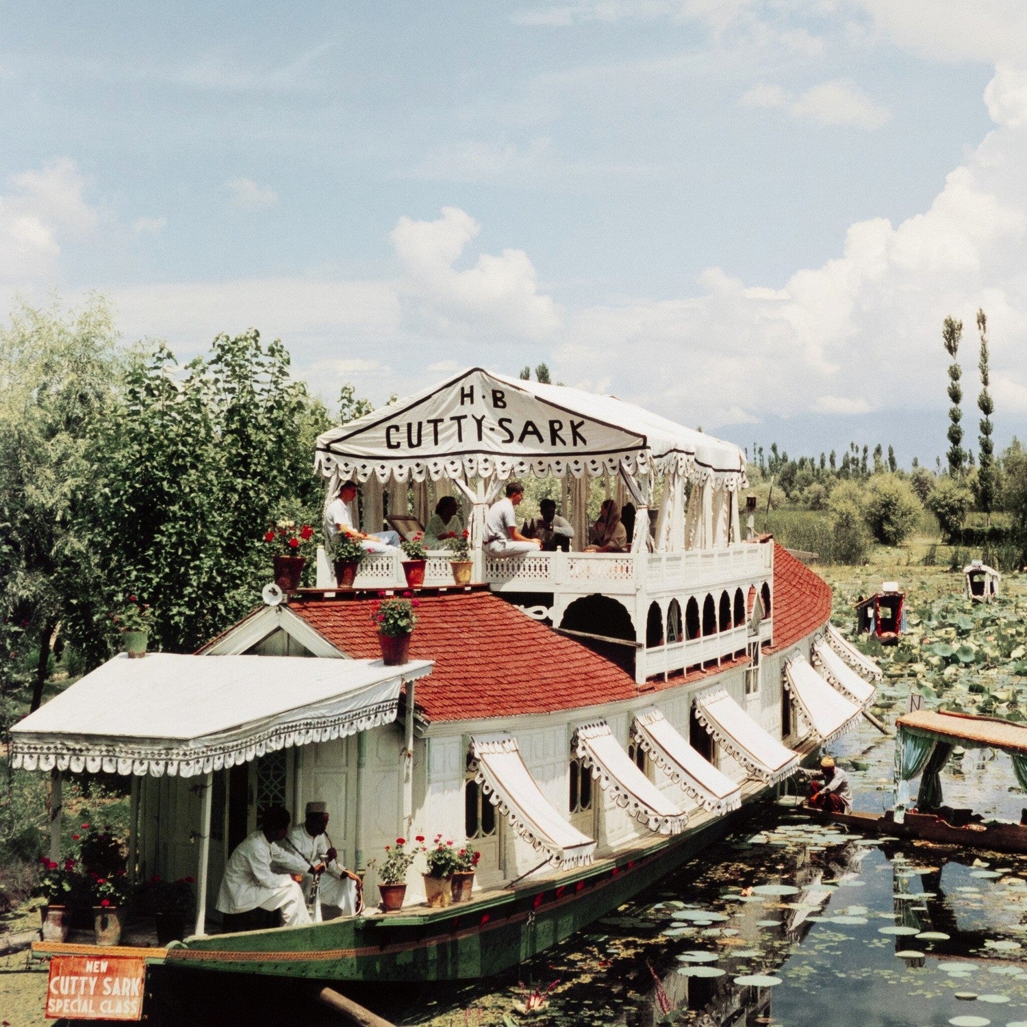 Jhelum River by Slim Aarons - White Maple Floater