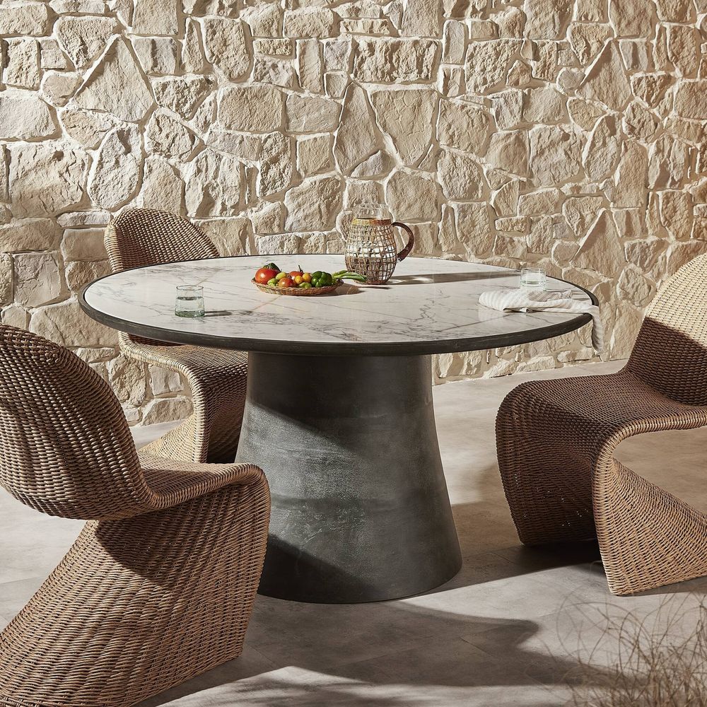 Additional view of Balboa Outdoor Dining Table, showing round top on flared conical pedestal base in white and charcoal gray.