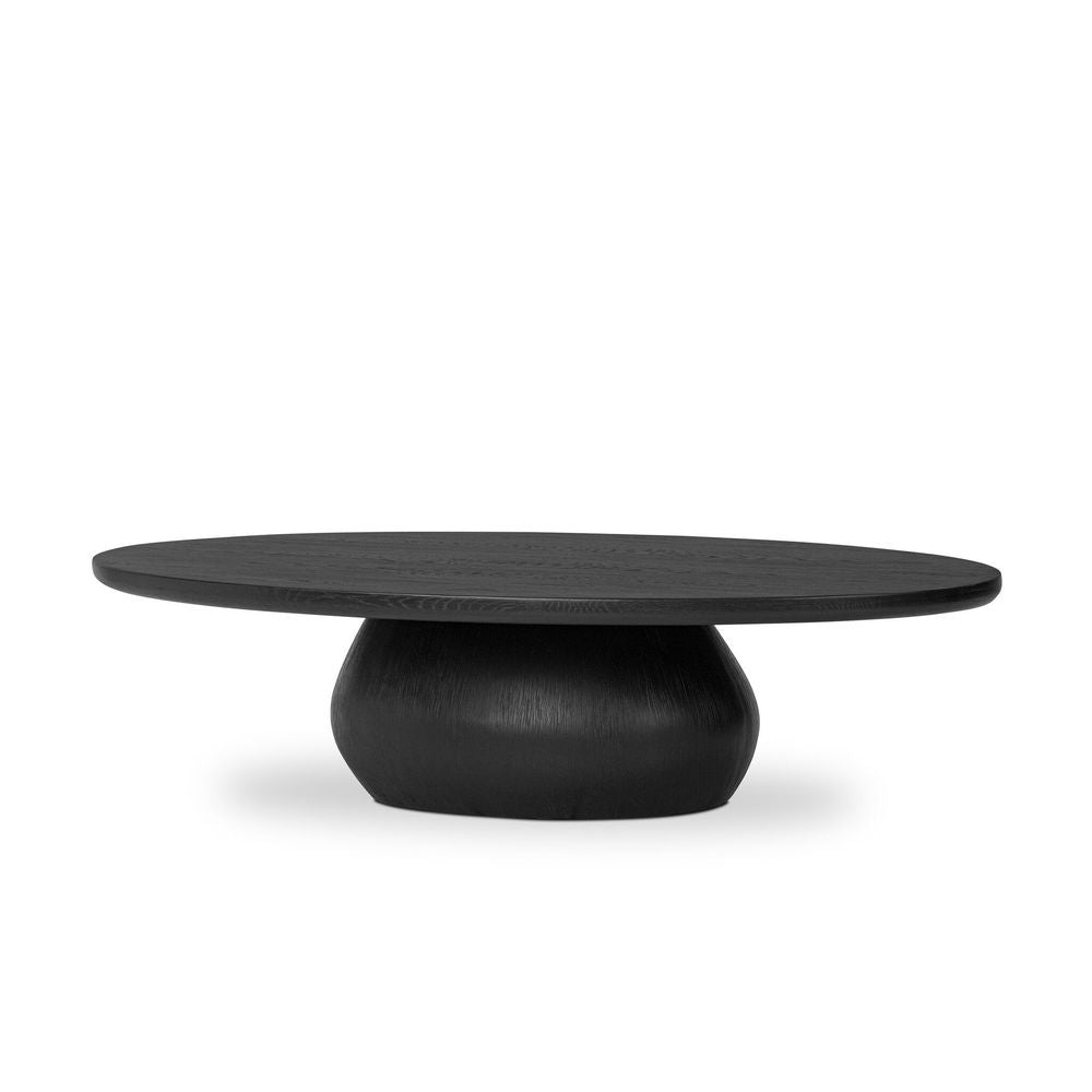 Alternate view of Eamon Coffee Table, featuring worn matte finish, wood veneer, resin, and a pedestal base.