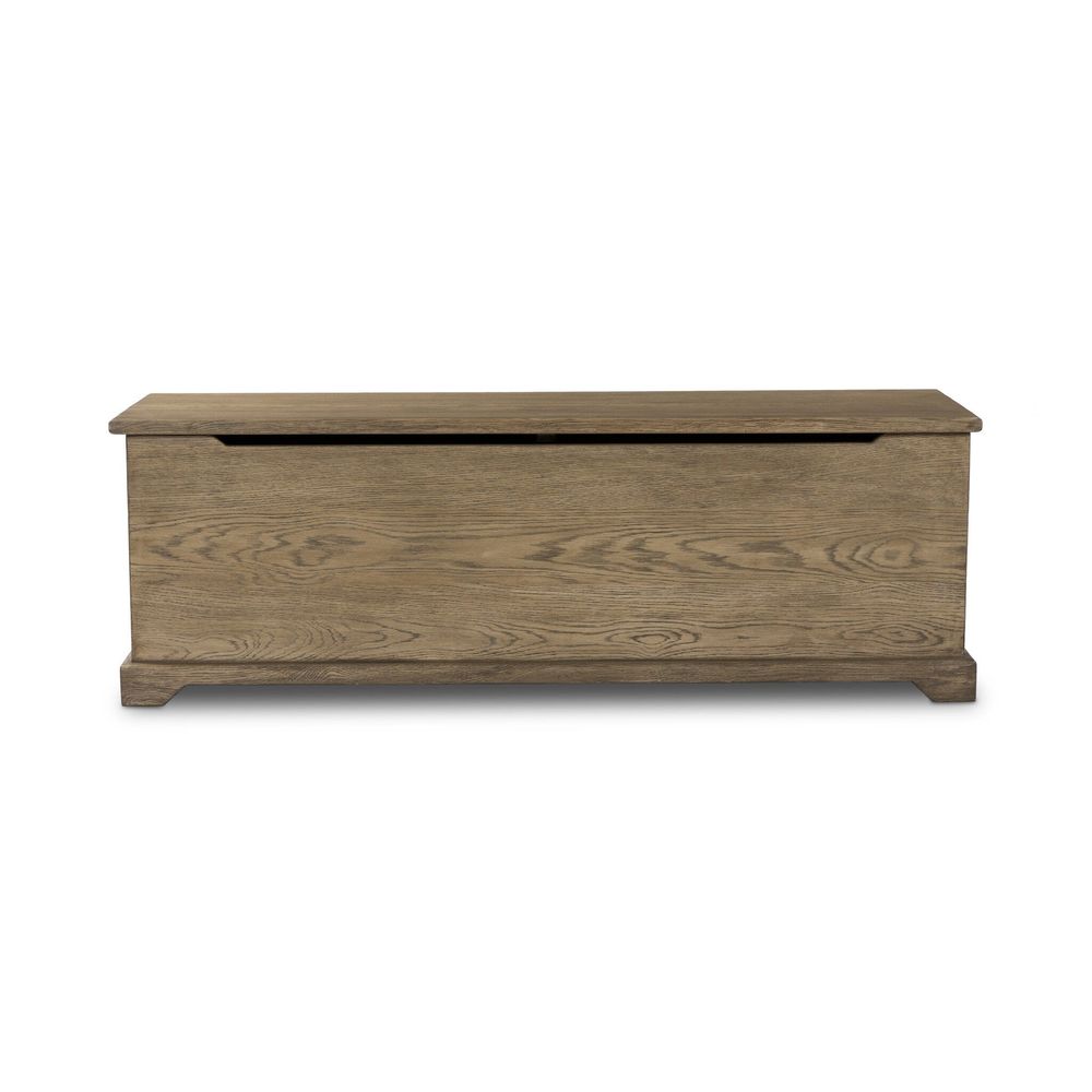 Quintin Trunk, shown in light brown and weathered oak with oak wood, solid wood, and integrated storage.
