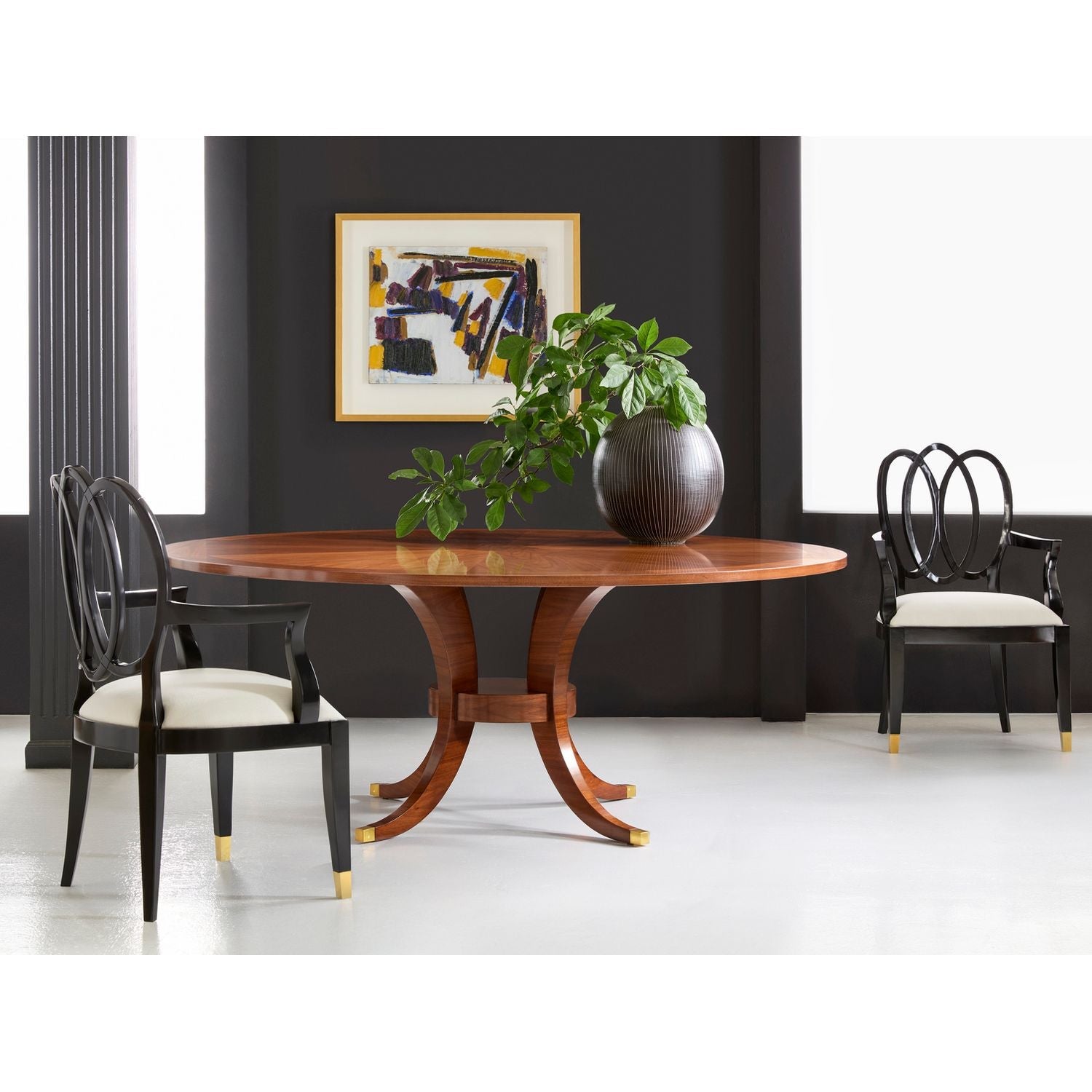 Alternate view of Riviere Dining Table, featuring wood, brass, and round pedestal base for open legroom.