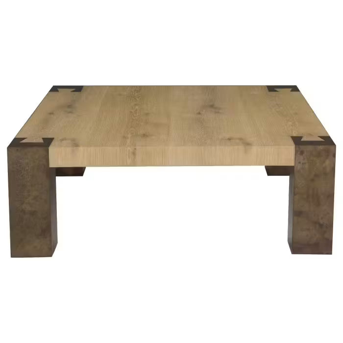 Wyatt Square Cocktail Table, shown in light natural oak and dark bronze-brown with solid wood, metal, and fixed block legs.