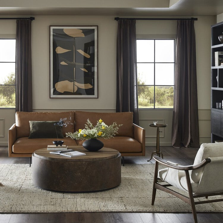 Additional view of Kipp Coffee Table in warm brown and rust brown, featuring sun-bleached finish and a solid drum base.