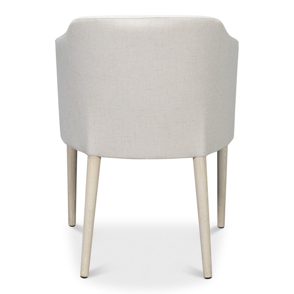 Additional view of Occasional Arm Chair, featuring textured upholstery finish, fabric, wood, and fixed integrated arms.