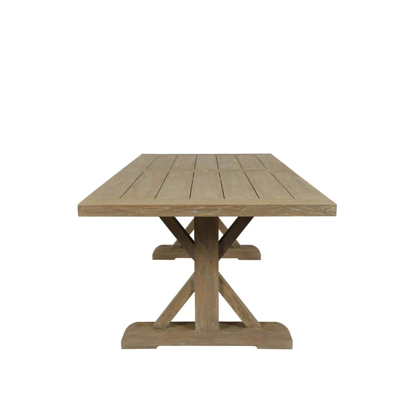 Additional view of Coastal Teak 94" Trestle Dining Table in light natural teak brown and warm beige-tan.