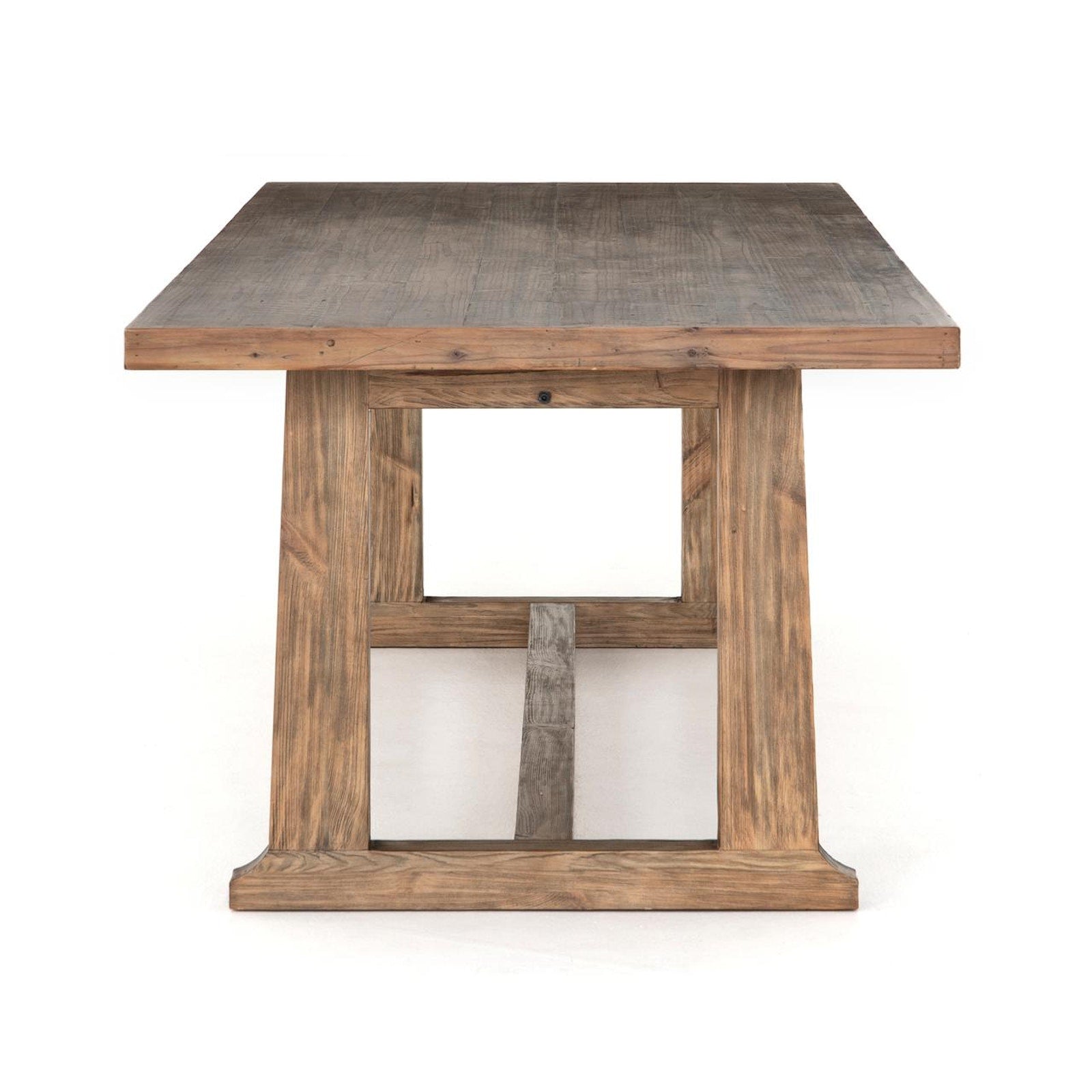 End view of the Four Hands Otto Dining Table showing its trestle base