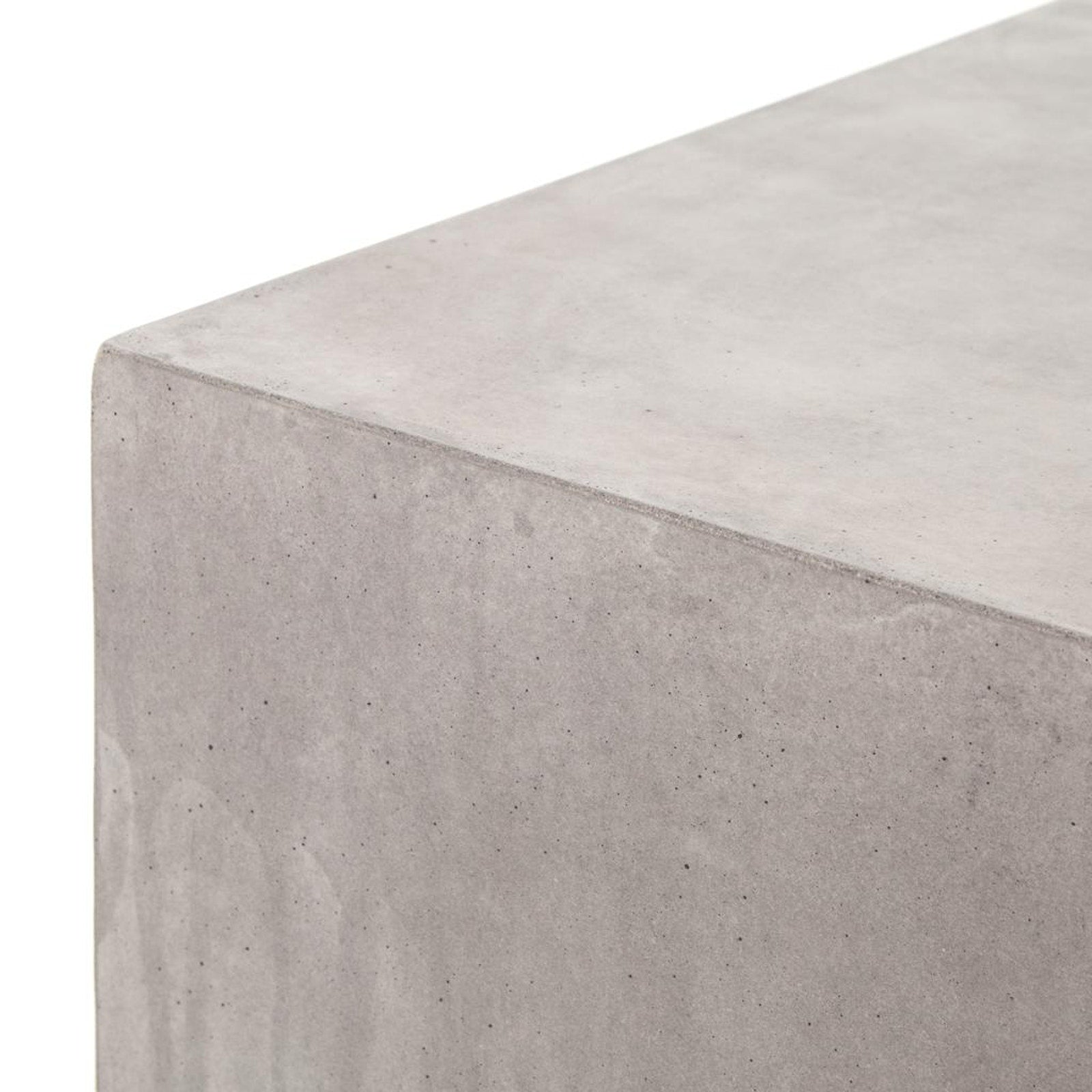 Close-up of the Parish Concrete Cube table edge and concrete surface